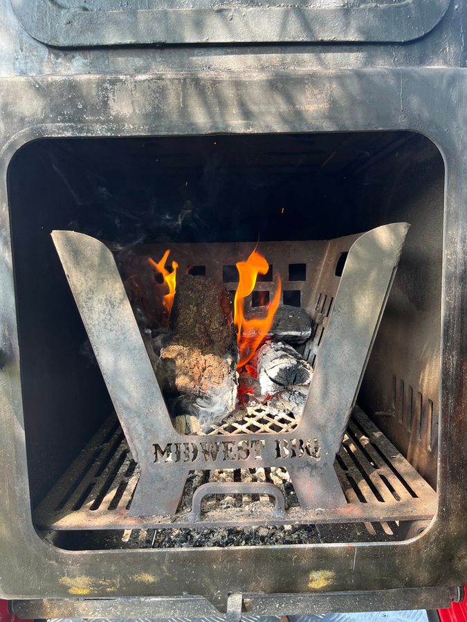 Oak logs burning in the firebox